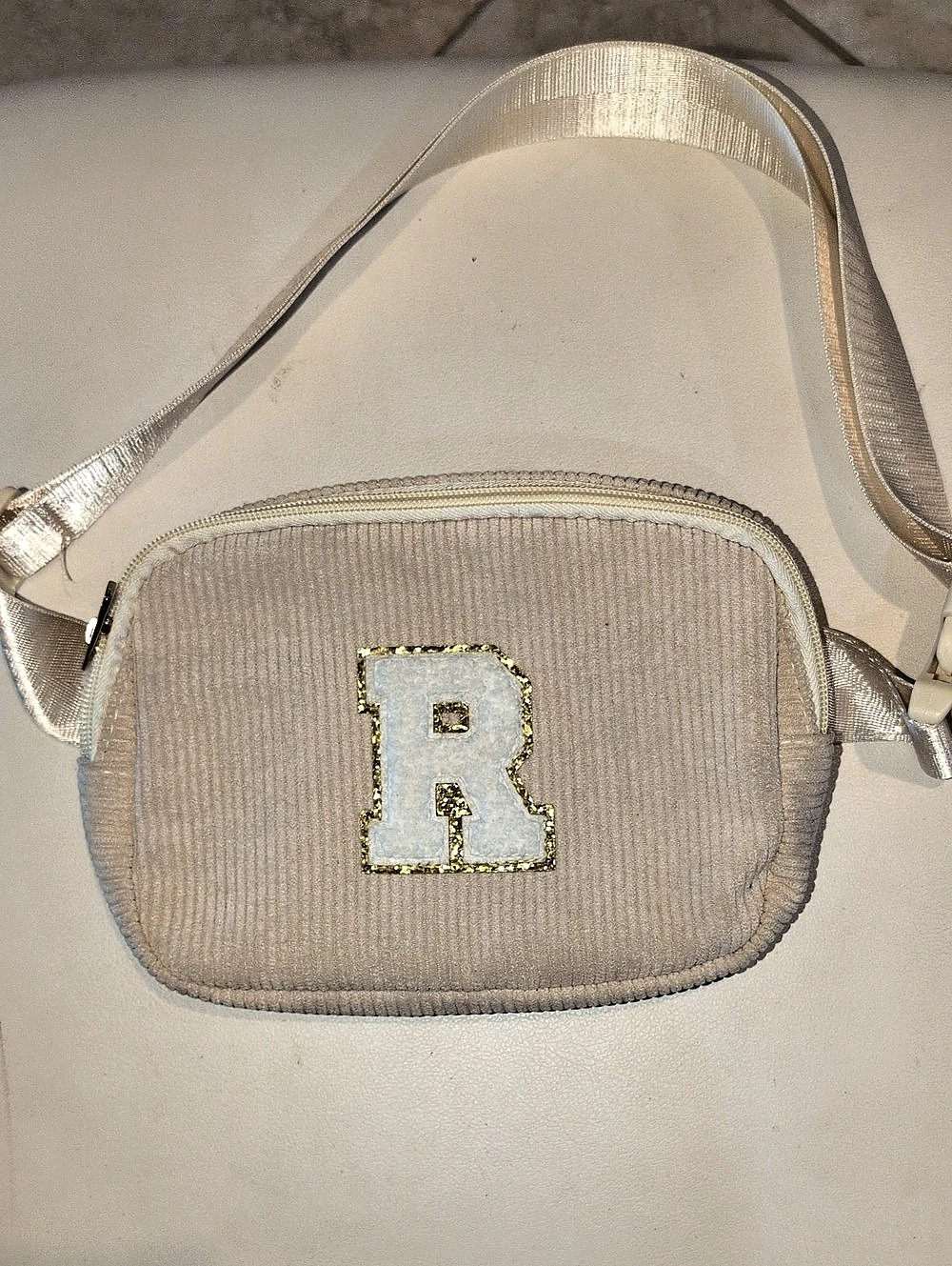 Cream Ribbed  Crossbody Bag With An "R" Patch On Front